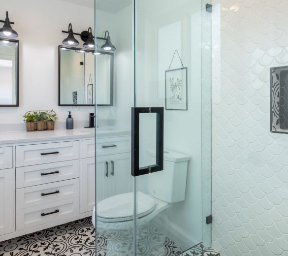monster sales cabinetry bathroom cabinets and toilet Well-lit bathroom exhibiting cabinets, faucets, mirrors, and countertops from Monster Sales, creating a harmonious and functional space.