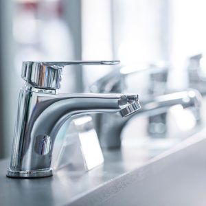 monstersales cabinetry faucets cover photo lassic widespread bathroom faucet set in polished nickel, featuring cross handles and displayed on a marble countertop.