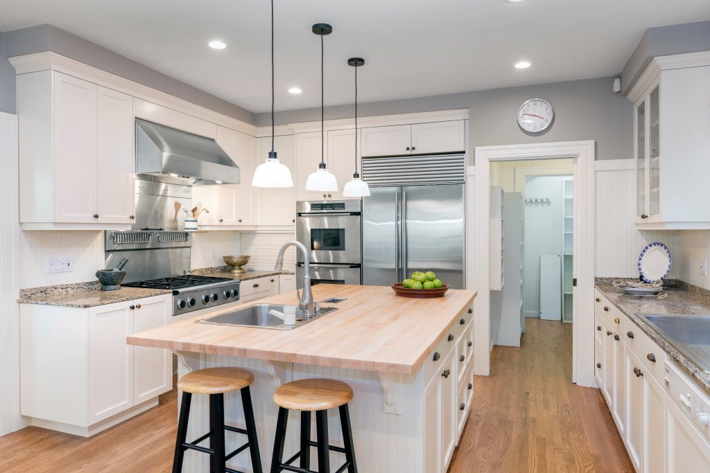 shaker style cabinets 4 Sleek and modern kitchen showcasing custom cabinets from Monster Sales USA, featuring clean lines and minimalist design.
